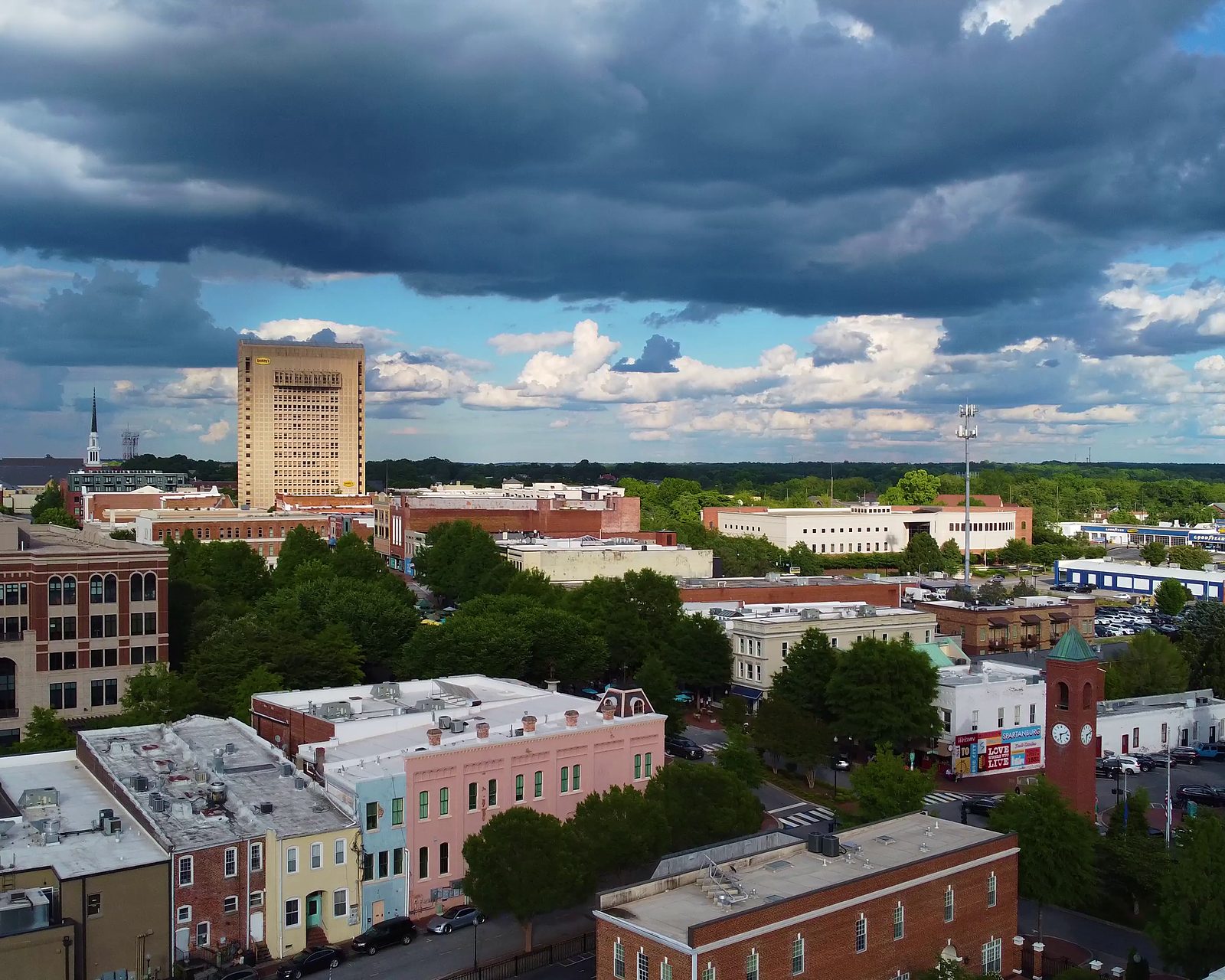 An aerial view of downtown Spartanburg, South Carolina, under storm clouds